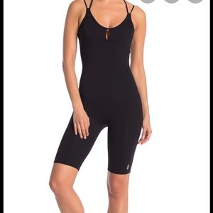Free People NWT glow one piece black sz Large